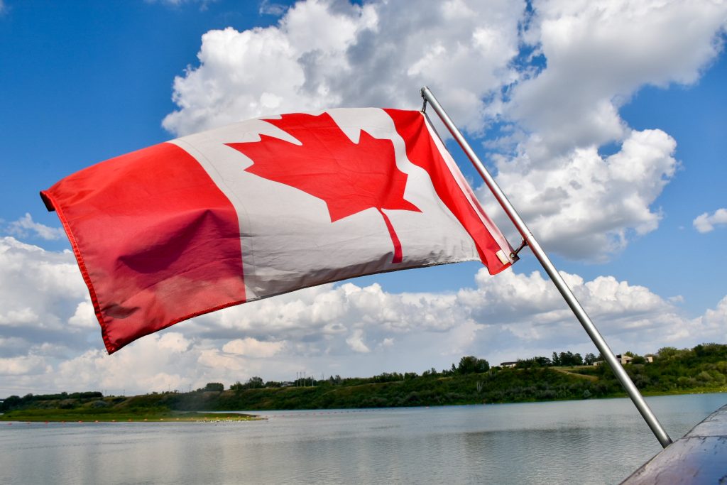 Canadian Flag flying from the Prairie Lily, Saskatchewan on Canadian Prairie road trip