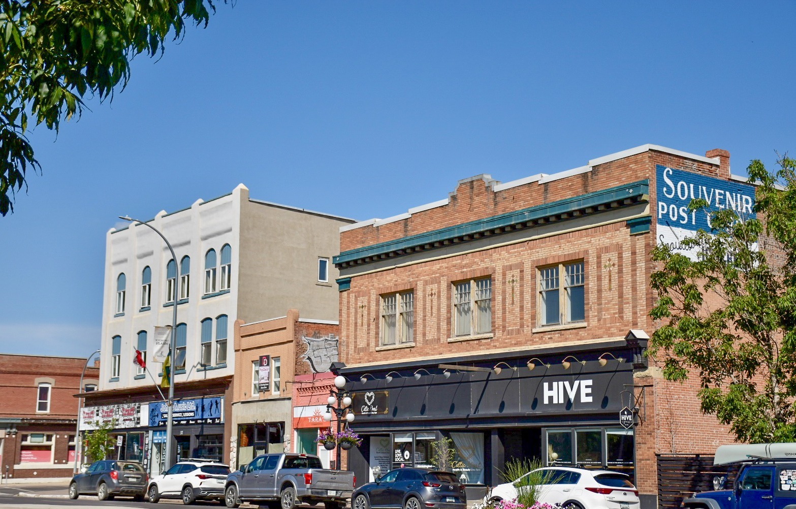 Pioneer style buildings - square brick buildings with flat roofs and shops on ground level