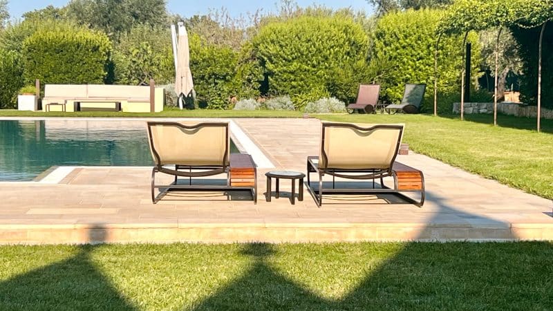 Sunloungers by the pool, villa holiday in Puglia, Italy, travelling with adult children