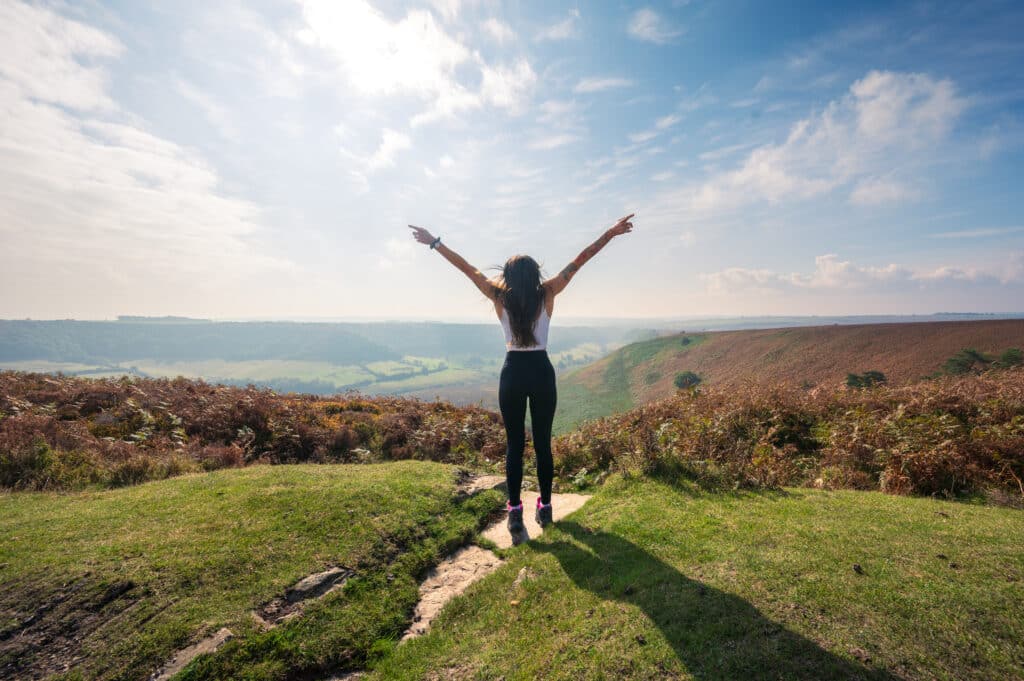 Girl stood on top of Hole of Horcum