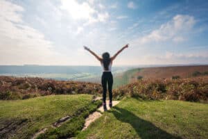 Girl stood on top of Hole of Horcum