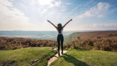 Girl stood on top of Hole of Horcum