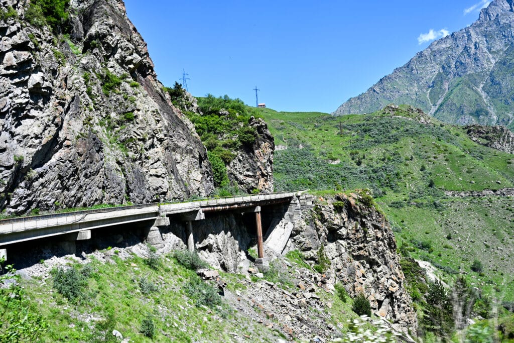 A road along side of Rocky Mountain.