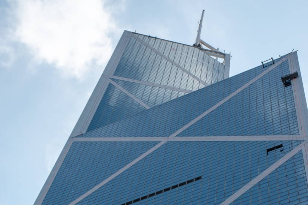 Looking up at the top of a glass office block