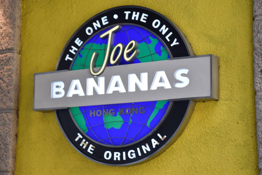 Sign for Joe Bananas bar on yellow wall
