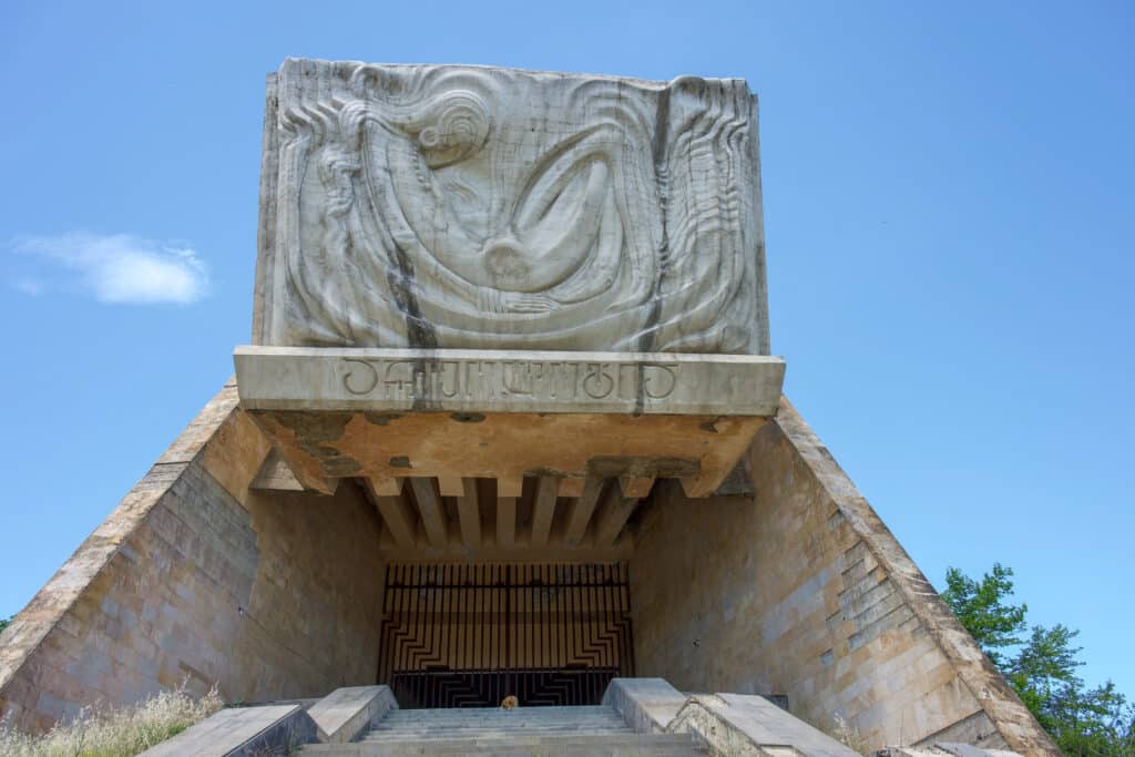 A carved stone plaque over entranceway