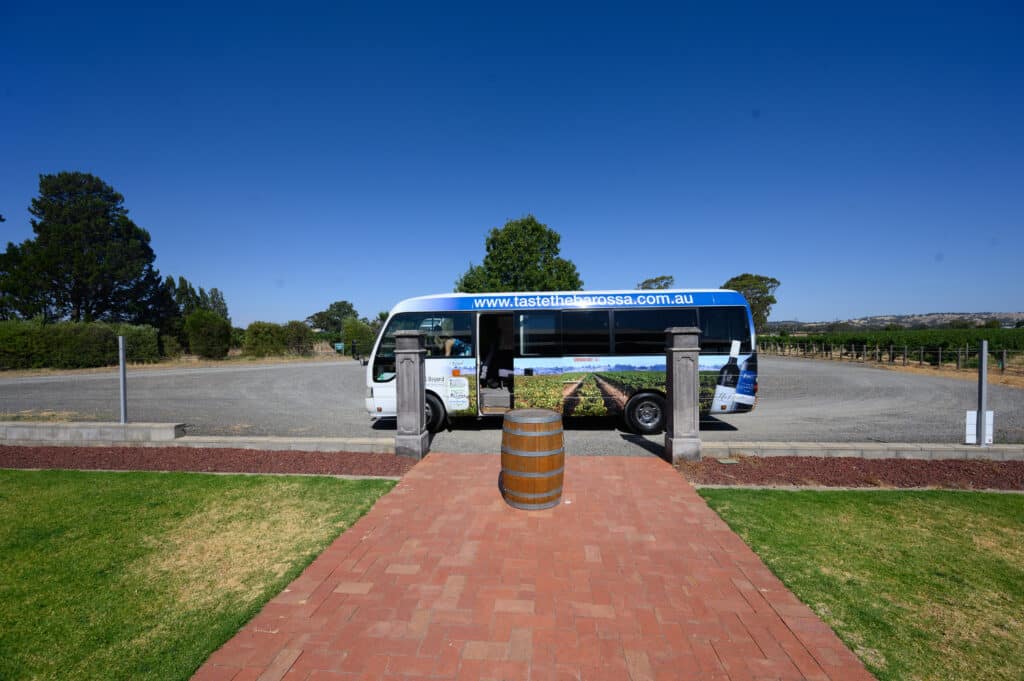 Barossa Valley tour bus parked at winery entrance
