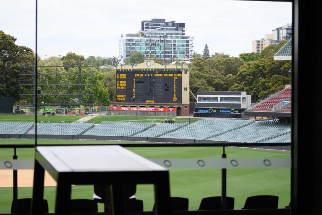 Adelaide Oval Tour traditional manual scoreboard and city view