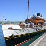 Old steamer paddle boat docked. The Waverley