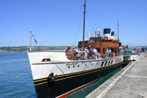 Old steamer paddle boat docked. The Waverley