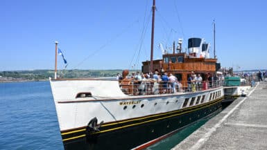 Old steamer paddle boat docked. The Waverley