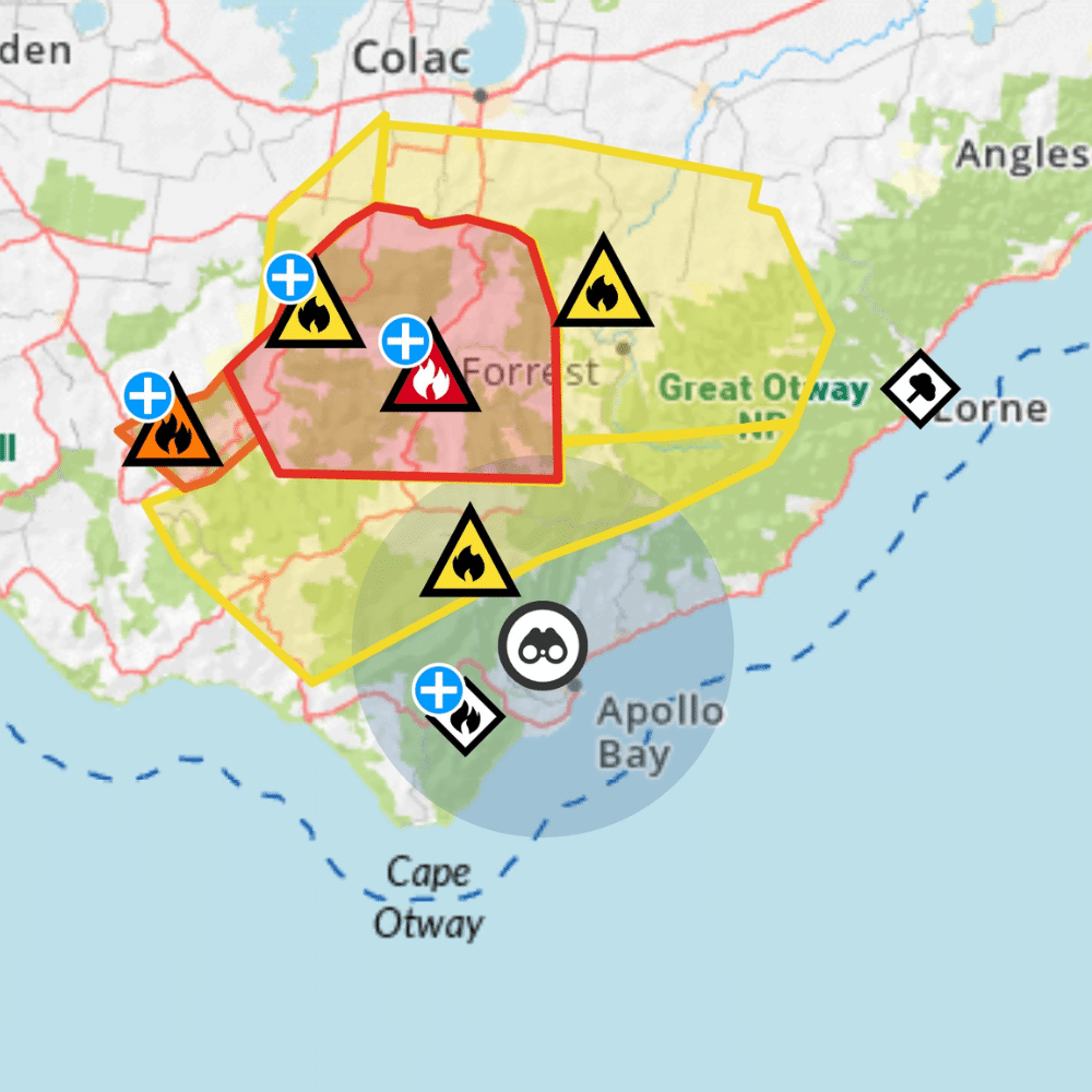 icEmergency map showing fire incident icons and coloured warning areas around Forrest and the Otways, inland from Apollo Bay.
